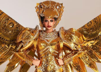 Miss Universe 2024 contestant Rhea Singha performs as a golden bird in a national costume round