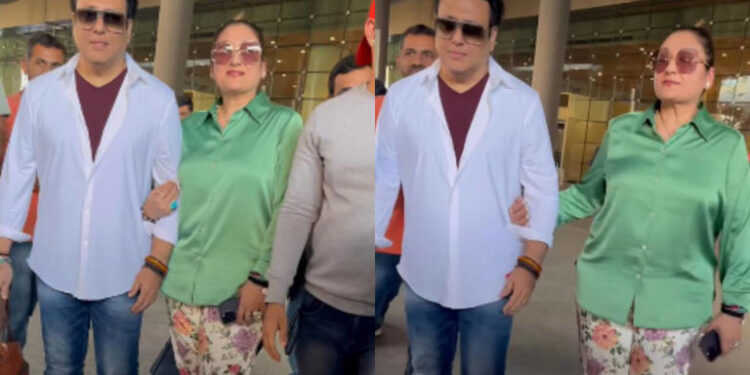 Govinda walks hand-in-hand with wife Sunita Ahuja at airport amid divorce rumours, days after Ganpati visit with Komal Rani Swarnkar:કોમલ રાણી સ્વર્ણકર સાથે ગણપતિ દર્શન કર્યાના થોડા દિવસો બાદ છૂટાછેડાની અફવાઓ વચ્ચે પત્ની સુનીતા આહુજા સાથે એરપોર્ટ પર હાથમાં હાથ નાખીને ચાલ્યા ગોવિંદા